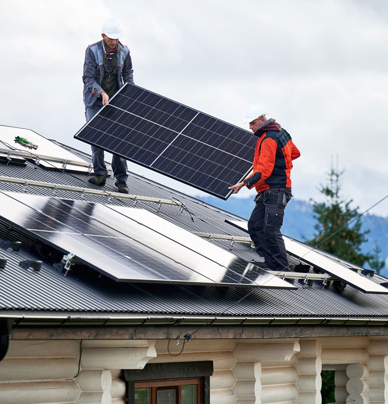 technicians-carrying-photovoltaic-solar-module-whi-2023-11-27-05-11-57-utc technicians-carrying-photovoltaic-solar-module-whi-2023-11-27-05-11-57-utc