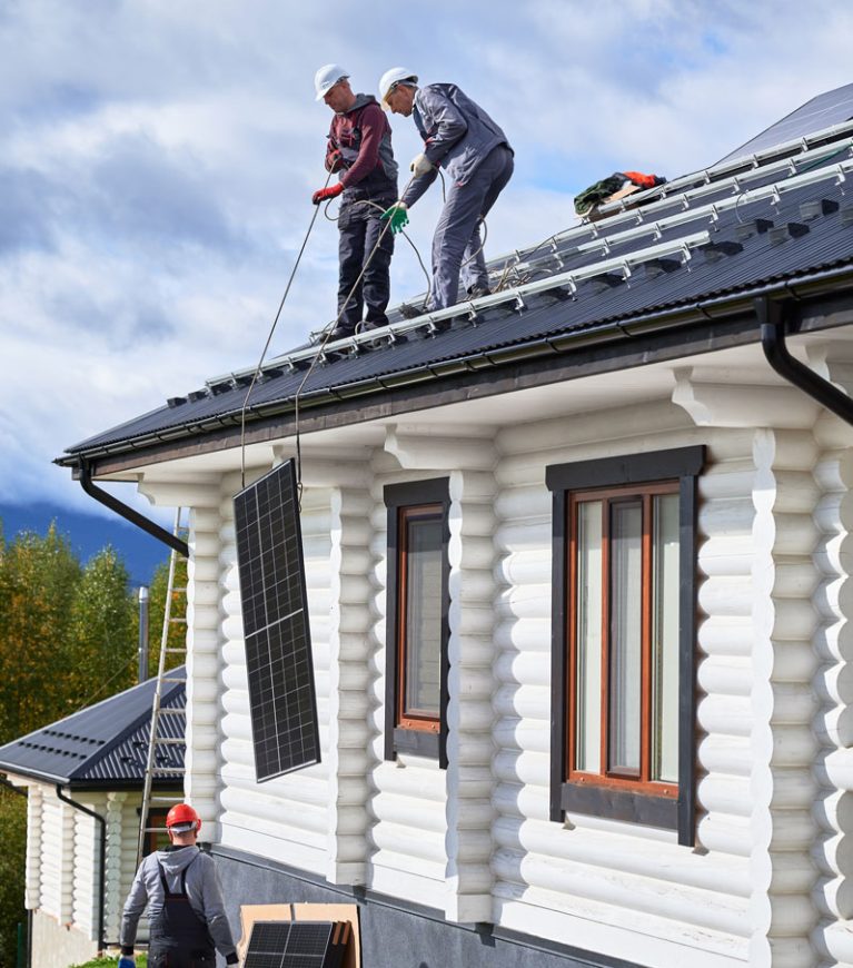 workers-lifting-up-photovoltaic-solar-module-while-2023-11-27-04-52-54-utc workers-lifting-up-photovoltaic-solar-module-while-2023-11-27-04-52-54-utc
